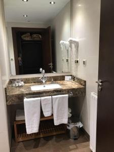 Koupelna v ubytování Hotel Entredos