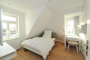 Postel nebo postele na pokoji v ubytování Designhotel Rosenbohm
