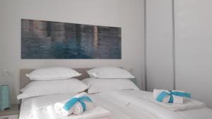 Posteľ alebo postele v izbe v ubytovaní Villa-Apartments Karmel