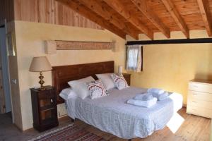 Postel nebo postele na pokoji v ubytování Castillo de Grisel