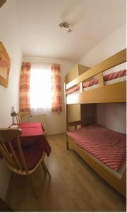 Postel nebo postele na pokoji v ubytování Ferienwohnung Moser am See