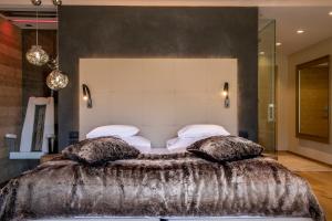 Postel nebo postele na pokoji v ubytování Hotel Gran Paradiso