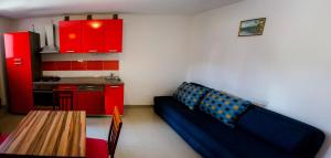 Kuchyň nebo kuchyňský kout v ubytování Apartments & Room Toni