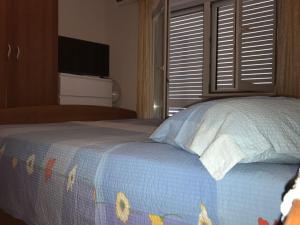 Postel nebo postele na pokoji v ubytování Apartment Nela