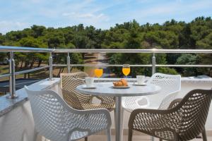 Balkón alebo terasa v ubytovaní Aparthotel Punta Blu - POOL & SPA