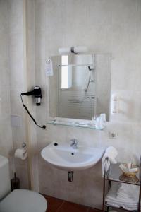 Koupelna v ubytování Dzintars Hotel