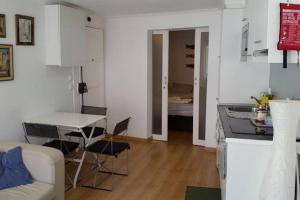 A kitchen or kitchenette at Alfama T1 Travel