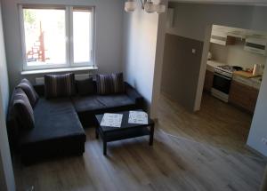 Kuchyňa alebo kuchynka v ubytovaní Apartament piętrowy nad morzem