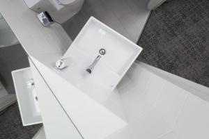 Kúpeľňa v ubytovaní Hotel Perła + 37 fotografií