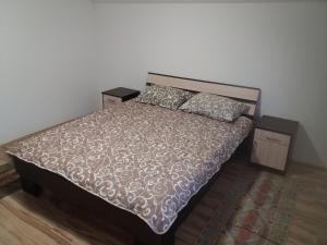 A bed or beds in a room at Apartment Sijakovic
