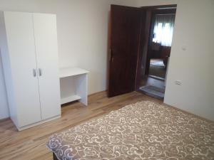 A bed or beds in a room at Apartment Sijakovic