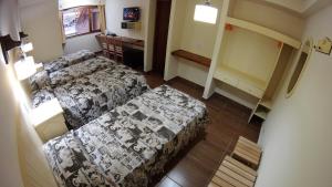 Cama ou camas em um quarto em Rosa De Los Vientos