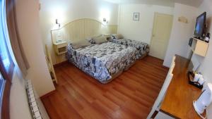 Cama ou camas em um quarto em Rosa De Los Vientos