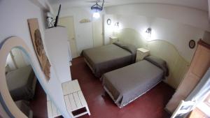 Cama ou camas em um quarto em Rosa De Los Vientos
