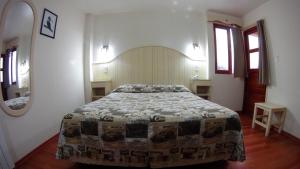 Cama ou camas em um quarto em Rosa De Los Vientos