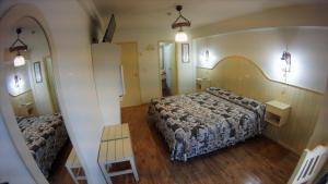 Cama ou camas em um quarto em Rosa De Los Vientos