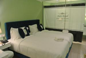 Postel nebo postele na pokoji v ubytování 1 Day Car Hotel Station 18