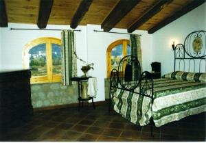 מיטה או מיטות בחדר ב-Casa Rural La Vall del Cadi