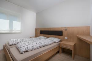 Postel nebo postele na pokoji v ubytování Appartamento Mirabell