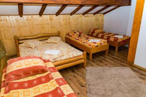 מיטה או מיטות בחדר ב-Cabana Groapa Seaca