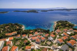 an aerial view of a small island in the water at Pharia Hotel and Apartments - by the beach in Hvar