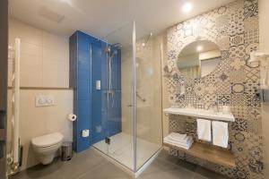 Kúpeľňa v ubytovaní Three Corners Lifestyle Hotel