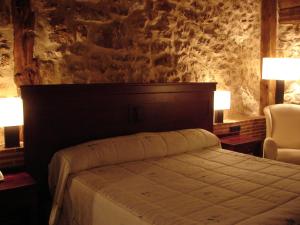 Postel nebo postele na pokoji v ubytování Posada Los Templarios