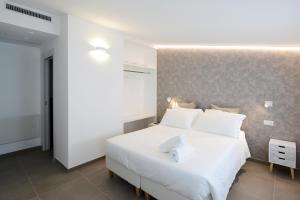 Postel nebo postele na pokoji v ubytování Miramed rooms