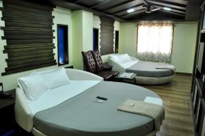 Hotel Anandhiram Heritage的休息区