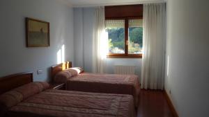 Posteľ alebo postele v izbe v ubytovaní Casa Respal EVI00158