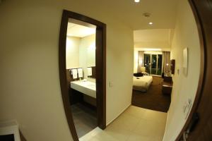 Ένα ή περισσότερα κρεβάτια σε δωμάτιο στο Citea Apart Hotel