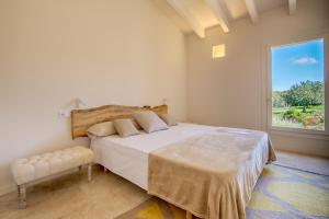 Postel nebo postele na pokoji v ubytování Es Lligats Agroturismo - Adults Only