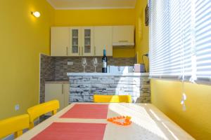 Kuchyň nebo kuchyňský kout v ubytování Apartment Milat
