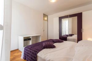 En eller flere senger på et rom på Apartment Lukic