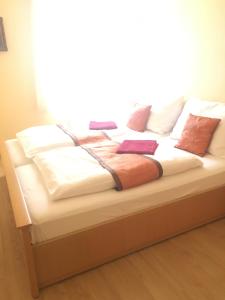 Letto o letti in una camera di Pension VIDHOUS 1