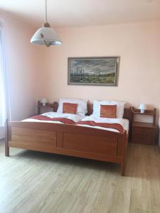Letto o letti in una camera di Pension VIDHOUS 1
