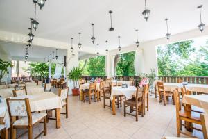 A restaurant or other place to eat at Arkutino Family Resort