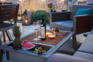 Nápoje v ubytovaní Luxury apartment Loreta