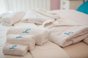 Posteľ alebo postele v izbe v ubytovaní Luxury apartment Loreta
