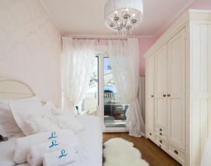 Posteľ alebo postele v izbe v ubytovaní Luxury apartment Loreta