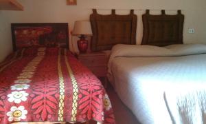 A bed or beds in a room at B&B Il Conventino