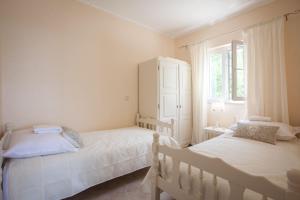 Postel nebo postele na pokoji v ubytování Villa Vintage & Modern