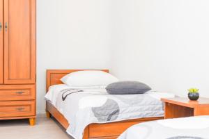 Postel nebo postele na pokoji v ubytování Apartments Miro