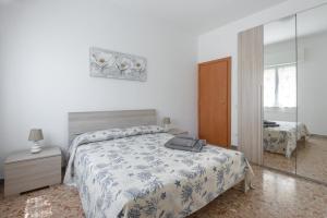 A bed or beds in a room at La casa di Giulia