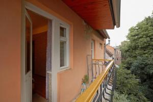 an open door on a balcony of a house at Apartment with courtyard in Lviv