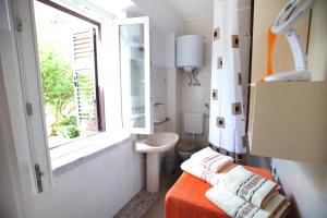 Postel nebo postele na pokoji v ubytování Rooms Feme