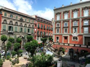 a group of buildings on a city street at B&B Bellini in Naples