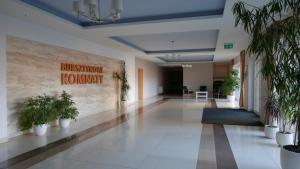 an office lobby with plants on the wall at Silver Bursztynowe Komnaty in Darlowko