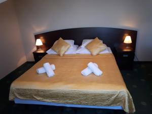 Postel nebo postele na pokoji v ubytování Villa Stella SPA