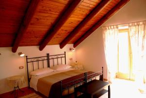 Posteľ alebo postele v izbe v ubytovaní B&B Beata Solitudo